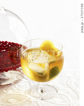 Glass of Lemon Lime Nastoyka (Russian Infused Vodka) With a Pitcher of Lingonberry Nastoyka 37537199