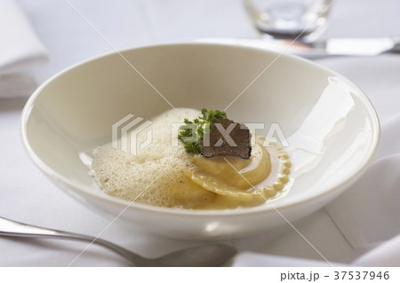 Duck Ravioli with a Truffle Mushroom Slice and Foam Sauce Duck Ravioli with a Truffle Mushroom Slice and Foam Sauce 37537946
