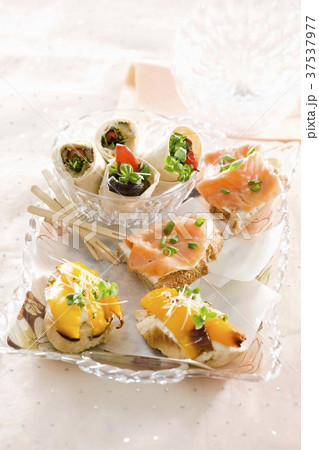 Colourful canapes on a plate 37537977