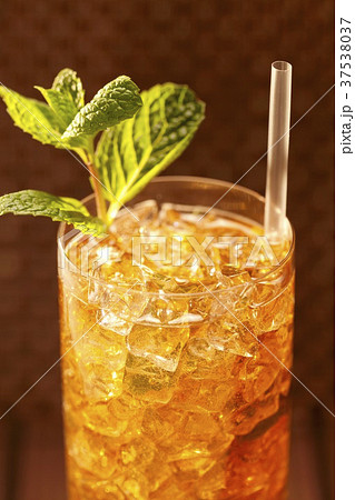 Mint Julep in a Glass with Straw and Mint Garnish Mint Julep in a Glass with Straw and Mint Garnish 37538037