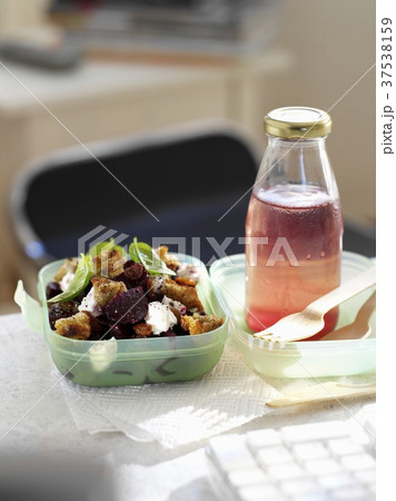 Beetroot salad with croutons and a bottle of juice for lunch Beetroot salad with croutons and a bottle of juice for lunch 37538159