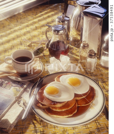 Diner Breakfast of Pancakes, Fried Eggs and Coffee 37538491