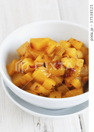 Mango chutney with red chilli peppers 37538525