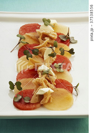 Melon salad with trout fillet 37538556