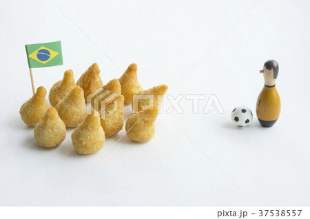 Salgadinhos with a Brazilian flag and football decorations 37538557