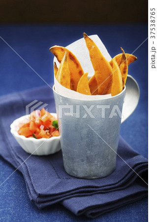 Sweet potato chips with salsa Sweet potato chips with salsa 37538765