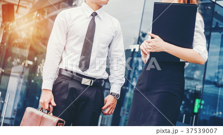 Asian Business people talking outside office 37539007