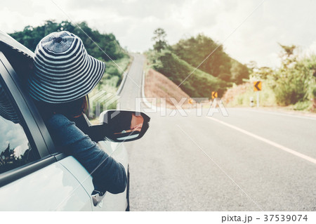 Asian woman traveler with car on Beautiful road Asian woman traveler with car on Beautiful road 37539074
