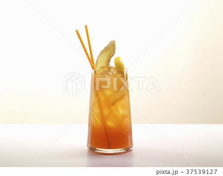 Fruity Cocktail in a Glass with Two Straws 37539127