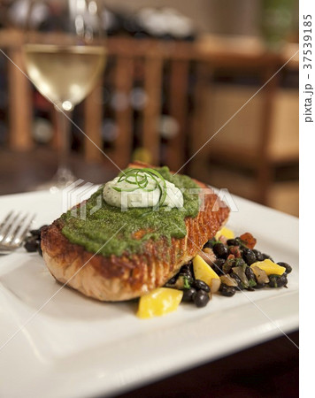 Grilled Salmon with Cilantro Aioli Over Chipotle and Mango Black Beans Grilled Salmon with Cilantro Aioli Over Chipotle and Mango Black Beans 37539185