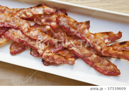 Oven Broiled Bacon in a White Serving Platter Oven Broiled Bacon in a White Serving Platter 37539609