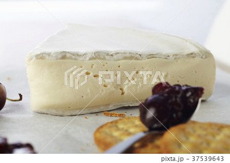 Cherry Compote with a Cracker and Brie Cheese Cherry Compote with a Cracker and Brie Cheese 37539643
