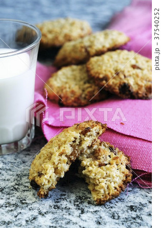 Oat biscuits and a glass of milk 37540252