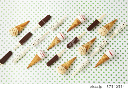 Various ice creams on a spotted surface Various ice creams on a spotted surface 37540554