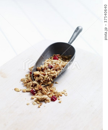Homemade muesli with dried cranberries on a scoop 37540640
