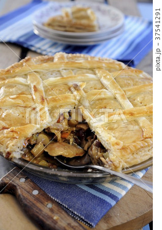 Rabbit and mushroom puff pastry pie Rabbit and mushroom puff pastry pie 37541291