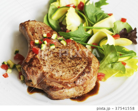 Veal Chop with Salad Veal Chop with Salad 37541558