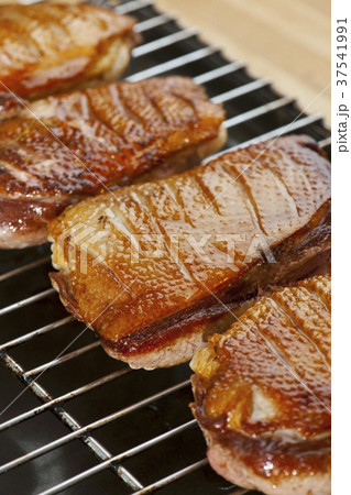 Duck breast on a wire rack 37541991