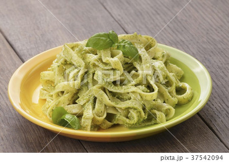 Tagliatelle with pesto and fresh basil 37542094