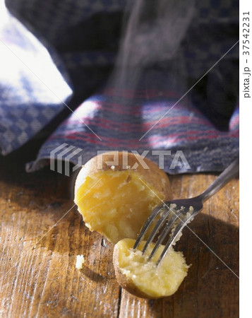 A semi-peeled potato 37542231