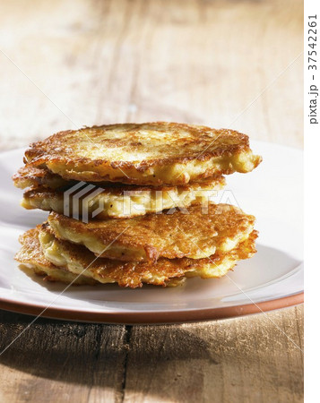 A stack of potato cakes A stack of potato cakes 37542261