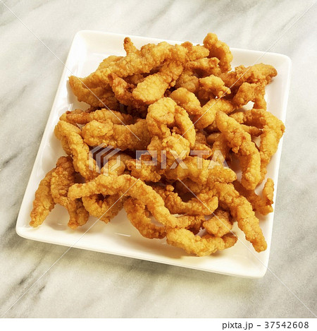 Fried Clam Strips on a White Dish 37542608