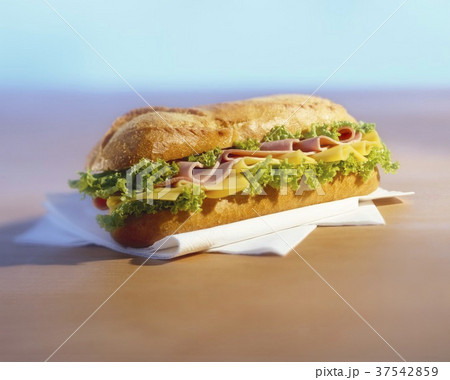 A ham, cheese and lettuce baguette A ham, cheese and lettuce baguette 37542859
