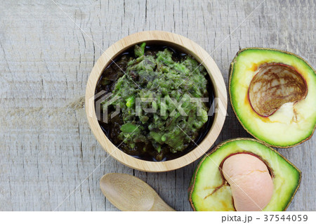 Avocado on wooden. Avocado on wooden. 37544059