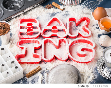 Flour letters spelling Baking with tools Flour letters spelling Baking with tools 37545800
