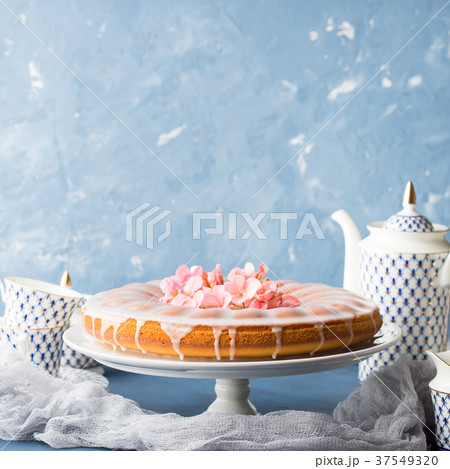 Bundt cake with frosting. Festive treat flowers 37549320