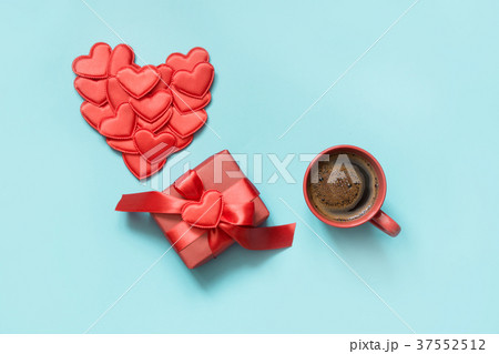 Valentine's card.Invitation with gift, red hearts. 37552512