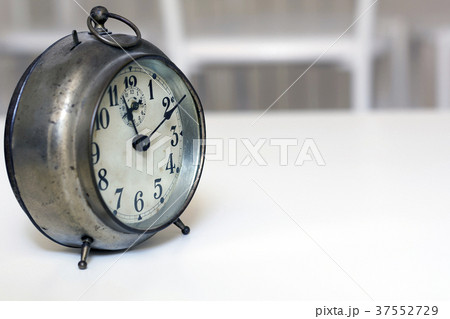 old clock on a white background 37552729
