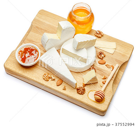 pile of brie or camambert cheese on white pile of brie or camambert cheese on white 37552994