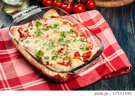 Traditional mexican enchiladas with chicken meat 37553340