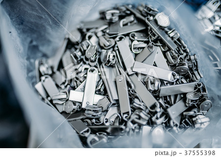 Zipper sliders for clothes closeup, nobody 37555398