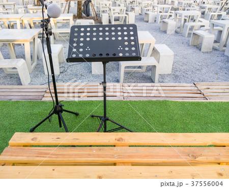 Microphone on the black stand. Microphone on the black stand. 37556004