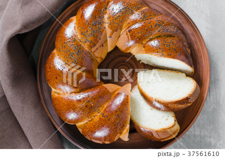 Wicker homemade bread. Sweet wheat sliced bun. 37561610