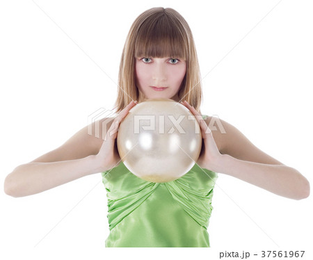 Beautiful woman with gold sphere in hand 37561967