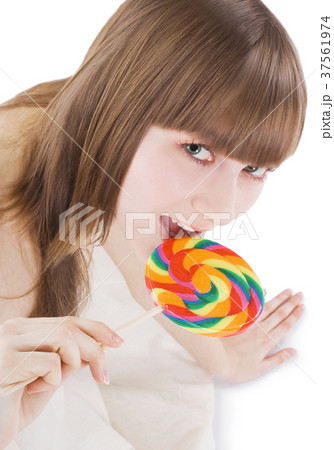 Bright picture of happy blonde with color lollipop Bright picture of happy blonde with color lollipop 37561974
