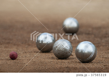 Metallic petanque four balls and a small wood jack Metallic petanque four balls and a small wood jack 37565319