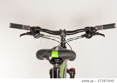 Bike handlebars, close up view, studio photo Bike handlebars, close up view, studio photo 37567040