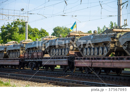 Cargo train carrying military tanks  37567093