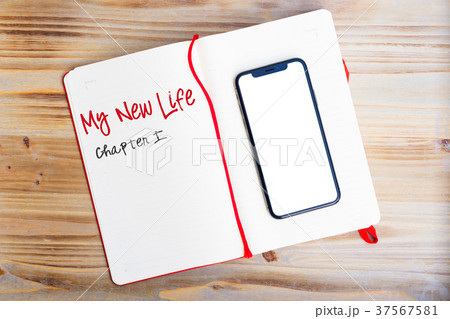 Notebook with phone 37567581