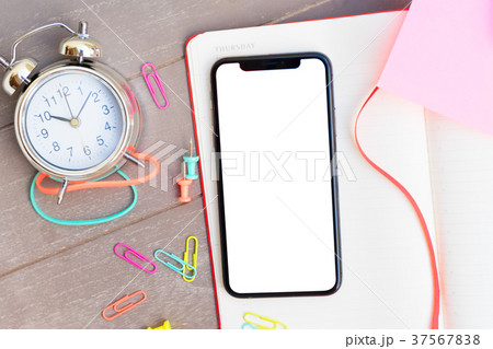 open notebook and phone 37567838