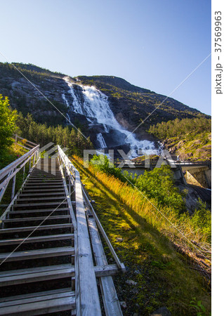 Summer mountain Langfossen waterfall on slope Etne 37569963