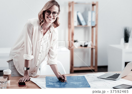 Beautiful engineer looking straight at camera Beautiful engineer looking straight at camera 37592465