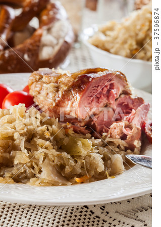 Pork knuckle with fried sauerkraut 37596874