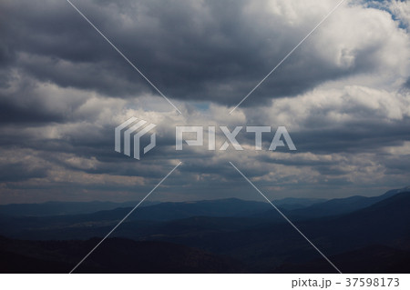 Beautiful cloudy sky in Carpatian Mountains 37598173