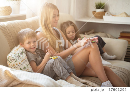 Happy family playing together 37601293