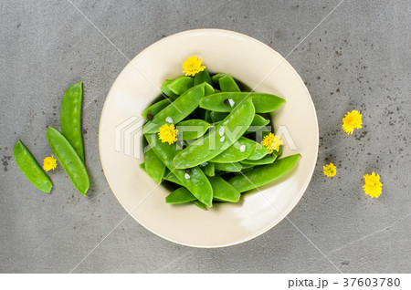Pile of fresh green sweet peas pods Pile of fresh green sweet peas pods 37603780